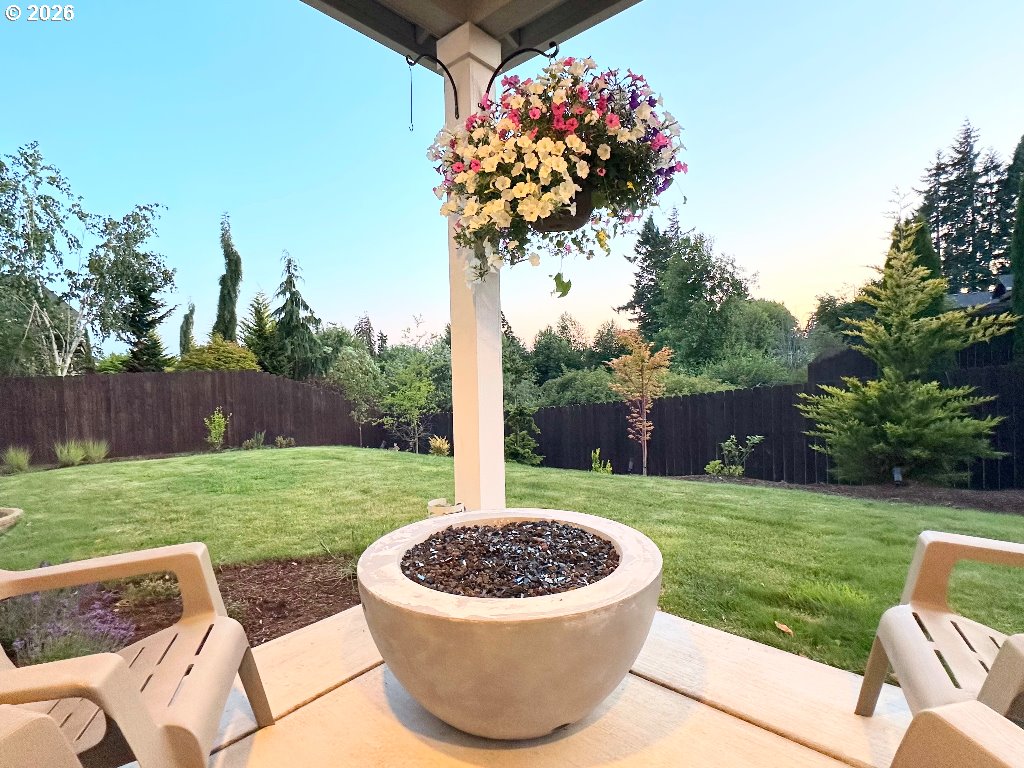 885 North Squire Drive Ridgefield, WA 98642 - Photo 26 of 29 a view of a backyard with a garden and plants