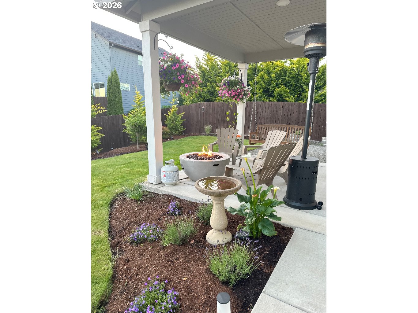 885 North Squire Drive Ridgefield, WA 98642 - Photo 27 of 29 a view of a porch with furniture and garden