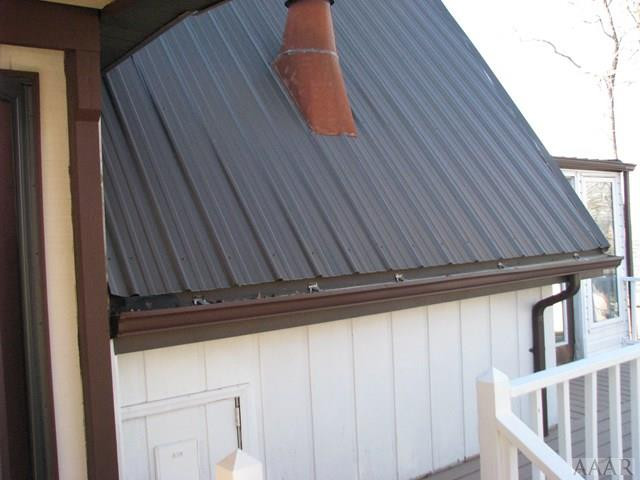 424 Beech Bay Road Roper, NC 27970 - Photo 31 of 35 Metal roof and gutters