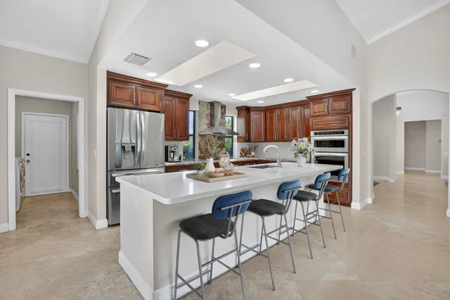 a bathroom with a sink a vanity and a mirror