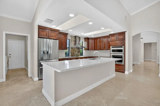 a bathroom with a tub a shower and a sink