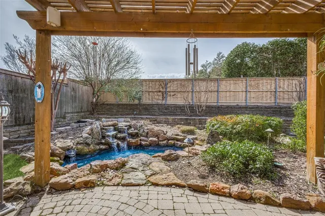 a view of a backyard of the house