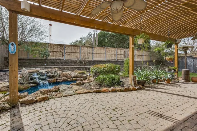 a view of a chairs and table in a patio