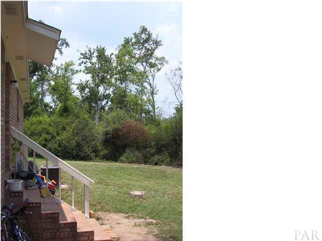 6380 Brickyard Road Molino, FL 32577 - Photo 8 of 17 Brick staircase with rail from backdoor that lead to backyard.