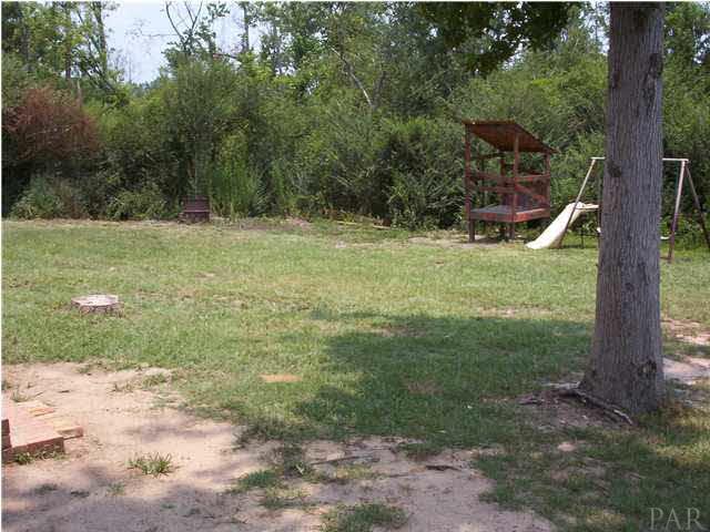 6380 Brickyard Road Molino, FL 32577 - Photo 10 of 17 Same position in backyard looking at Left side of property.