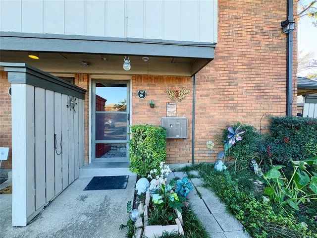 a front view of a house with a garage
