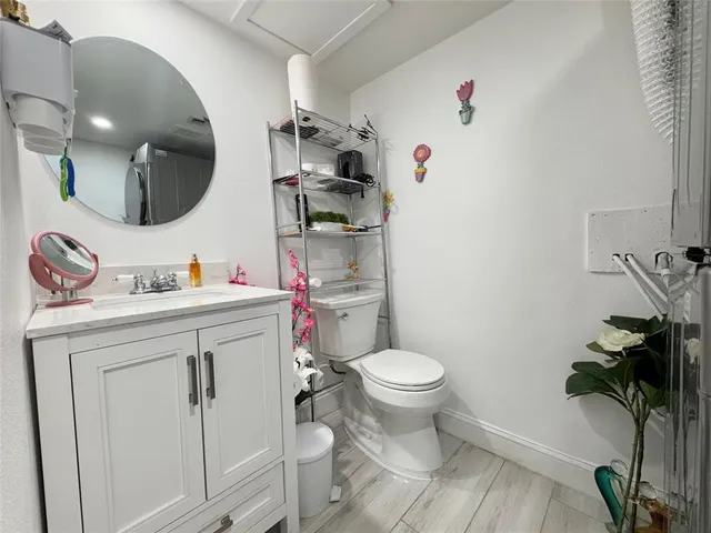 a large white bed in a white room