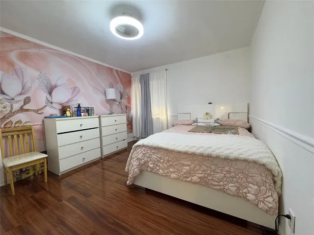 a bedroom with a bed and a cabinets