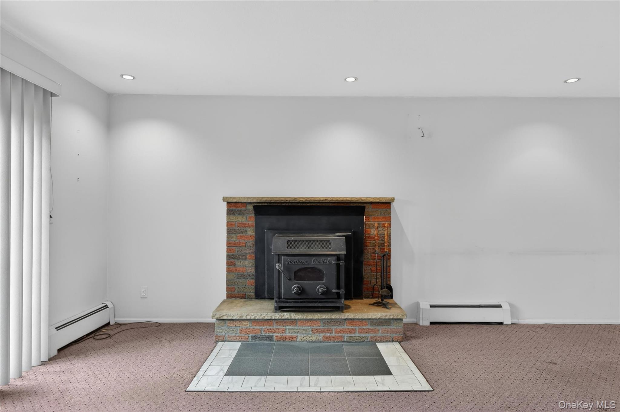 155 Pine Tree Road Monroe, NY 10950 - Photo 16 of 49 a living room with a fireplace