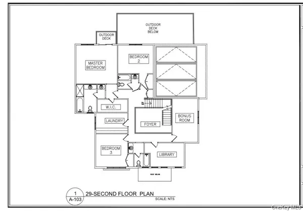 a view of dirt field with trees in the background