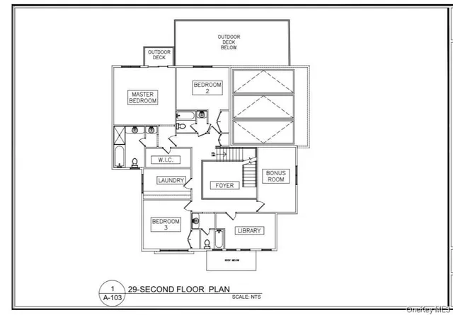 a view of dirt field with trees in the background