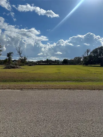 a view of a lake with mountains in the background