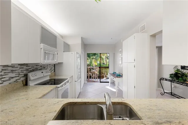 $319,000 | 1828 Kings Lake Boulevard, Unit 103, Naples, FL 34112