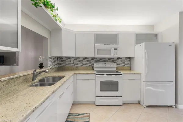 $319,000 | 1828 Kings Lake Boulevard, Unit 103, Naples, FL 34112
