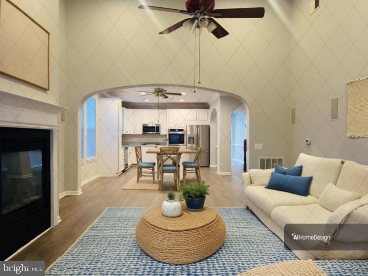 3135 Floating Leaf Lane Waldorf, MD 20603 - Photo 2 of 100 a living room with furniture and a fireplace