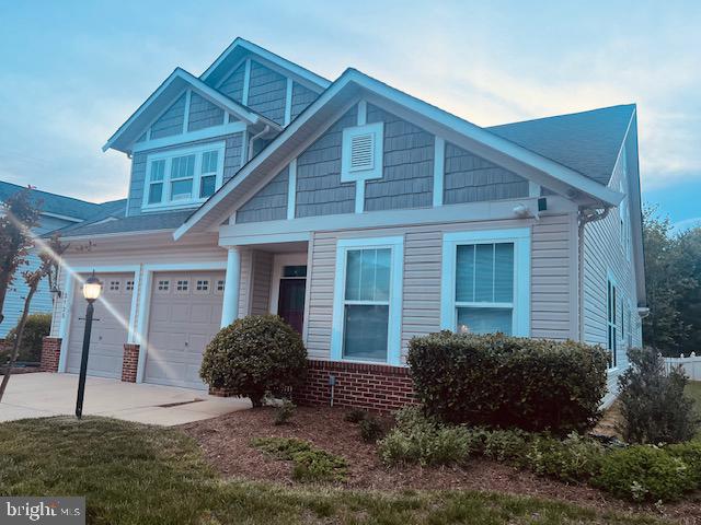 3135 Floating Leaf Lane Waldorf, MD 20603 - Photo 77 of 100 a front view of a house with a yard