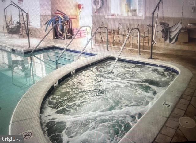 3135 Floating Leaf Lane Waldorf, MD 20603 - Photo 97 of 100 a view of a swimming pool with a patio