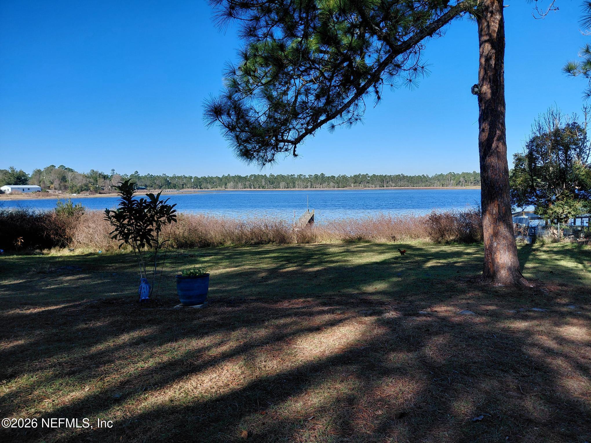 147 Jaffa Road Crescent City, FL 32112 - Photo 6 of 19 a view of a lake with a lake