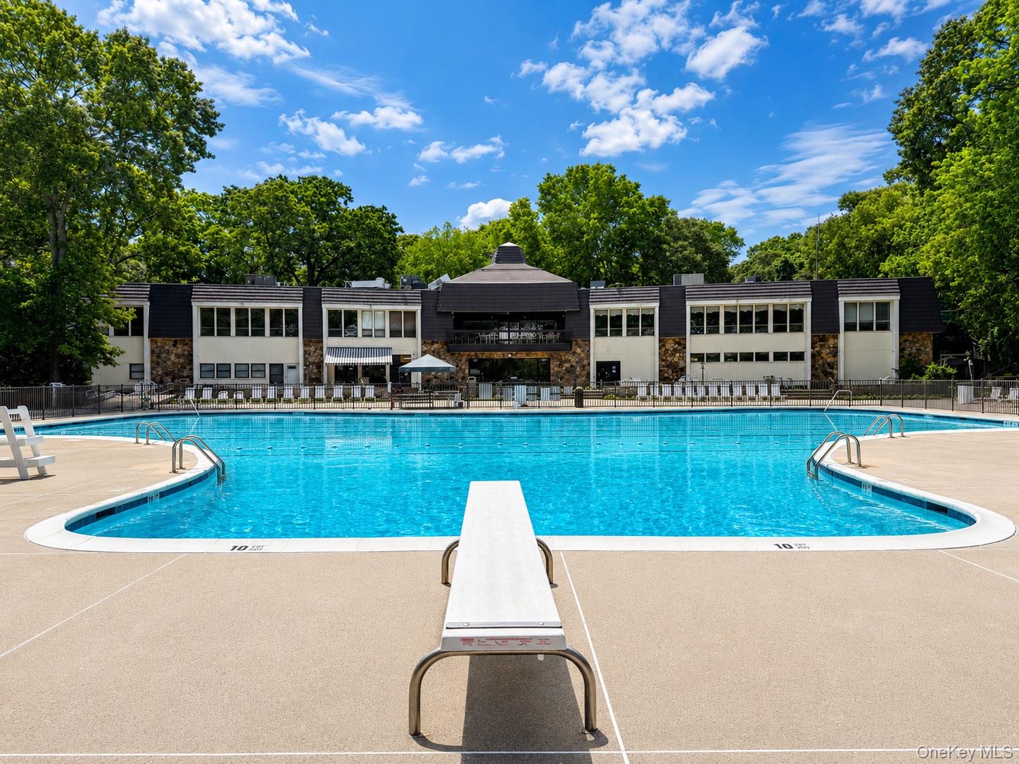 201 Birchwood Road, Unit 201 Coram, NY 11727 - Photo 20 of 27 a view of a house with swimming pool and yard