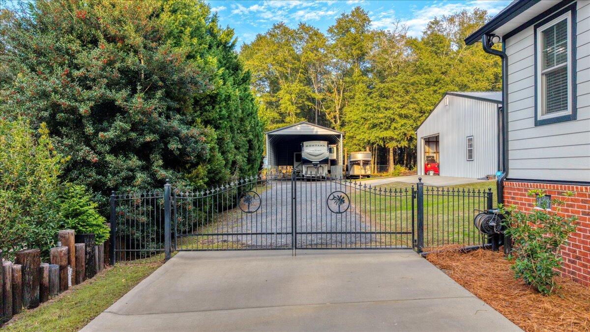 3687 Princess Pond Road Summerton, SC 29148 - Photo 73 of 80 Gated Driveway