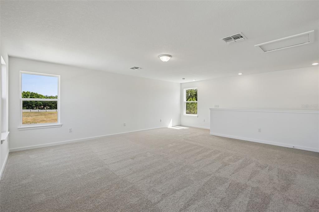 9932 Redwood Rdg Avenue Riverview, FL 33578 - Photo 22 of 38 a view of an empty room with a window