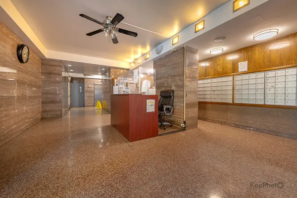 a view of a projector room with a ceiling fan