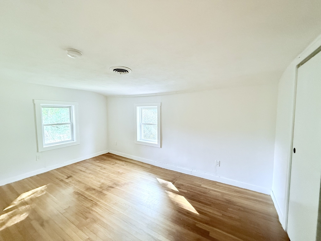 975 South Main Street Bellingham, MA 02019 - Photo 14 of 38 a view of empty room with wooden floor