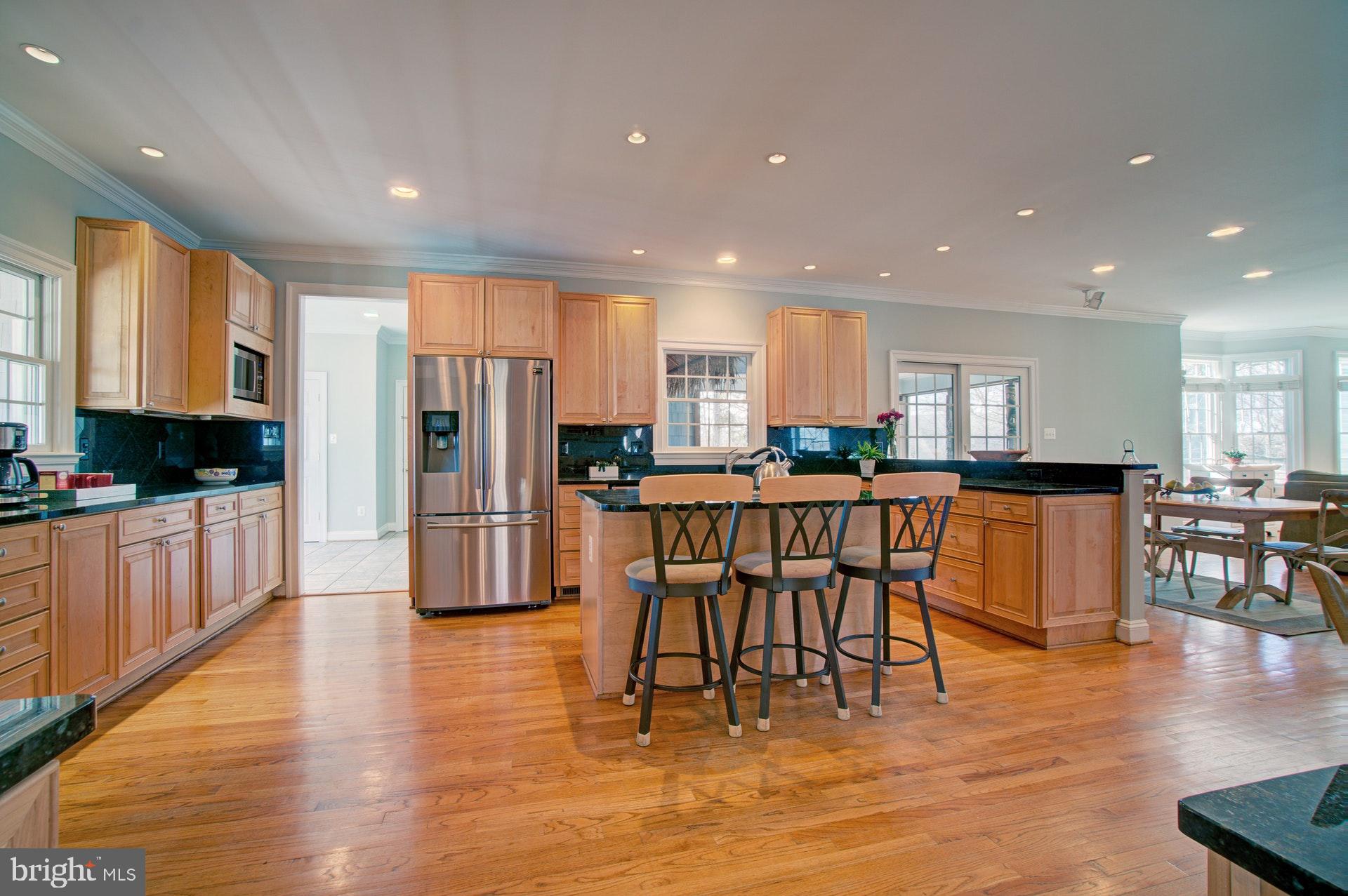 236 Manvell Road Southeast Vienna, VA 22180 - Photo 8 of 34 Kitchen overlooks family room