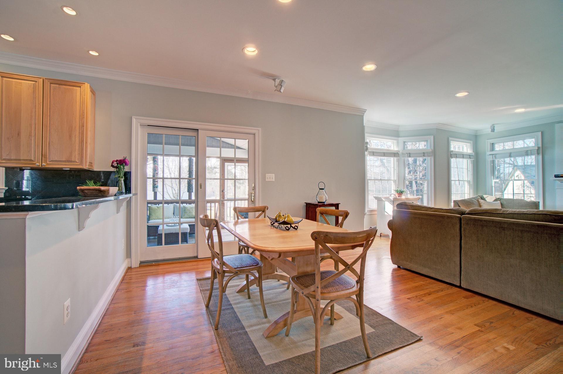 236 Manvell Road Southeast Vienna, VA 22180 - Photo 10 of 34 Breakfast table area w/ doors to screened porch