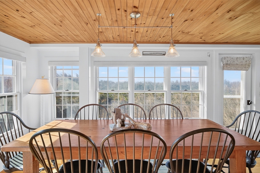1145 Kingsbury Beach Road Eastham, MA 02642 - Photo 20 of 42 a view of a balcony with an outdoor space