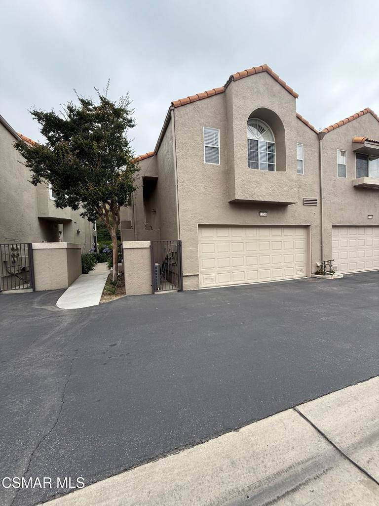 11346 Old Ranch Circle Chatsworth, CA 91311 - Photo 1 of 18 a view of a house with a street