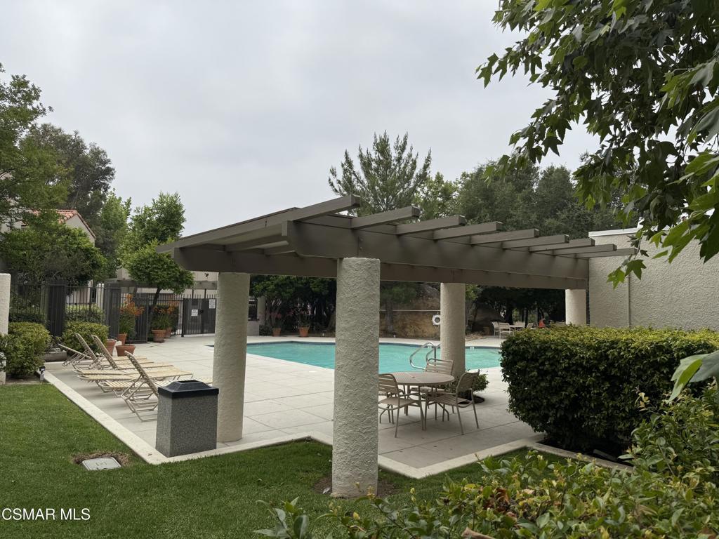 11346 Old Ranch Circle Chatsworth, CA 91311 - Photo 18 of 18 a front view of a house with a yard