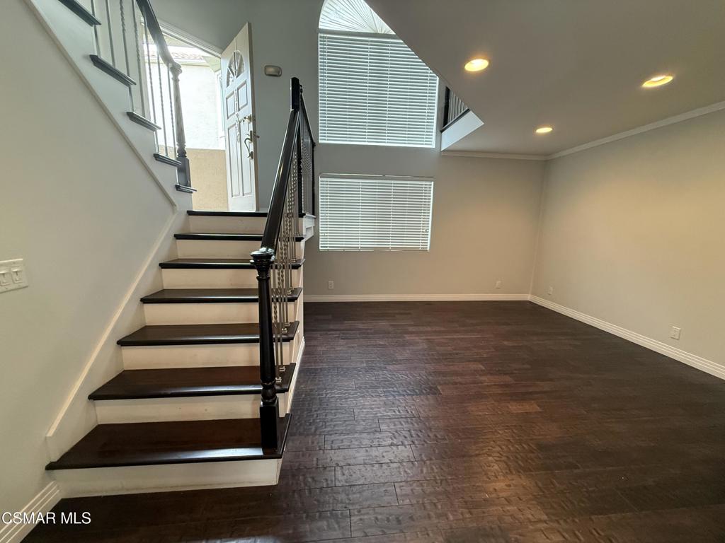 11346 Old Ranch Circle Chatsworth, CA 91311 - Photo 4 of 18 a view of entryway with wooden floor and stairs