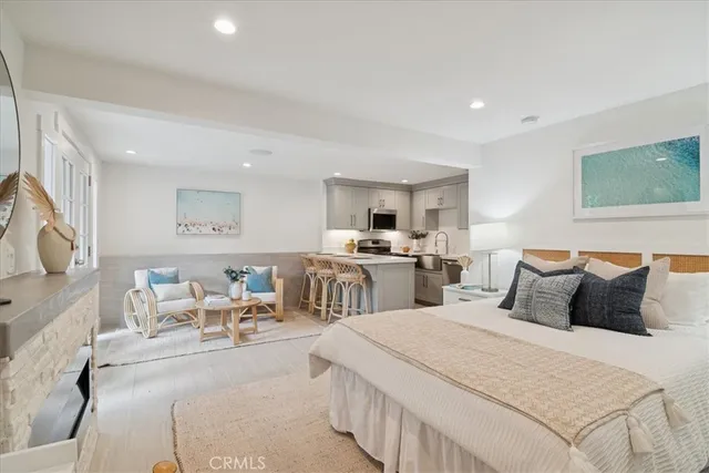 a view of a yard with wooden fence