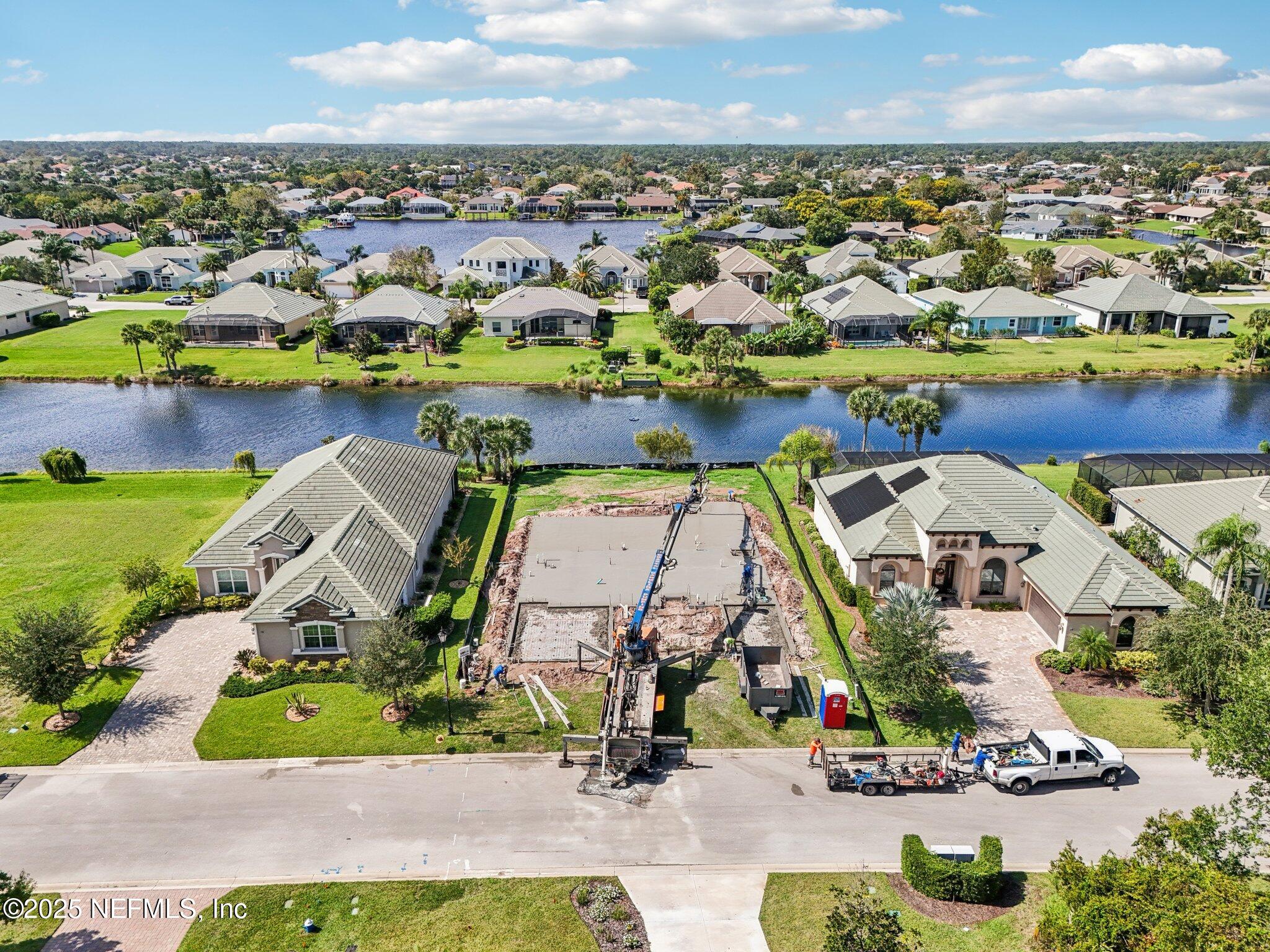 116 Longview Way North Palm Coast, FL 32137 - Photo 15 of 32 an aerial view of residential houses with outdoor space and swimming pool