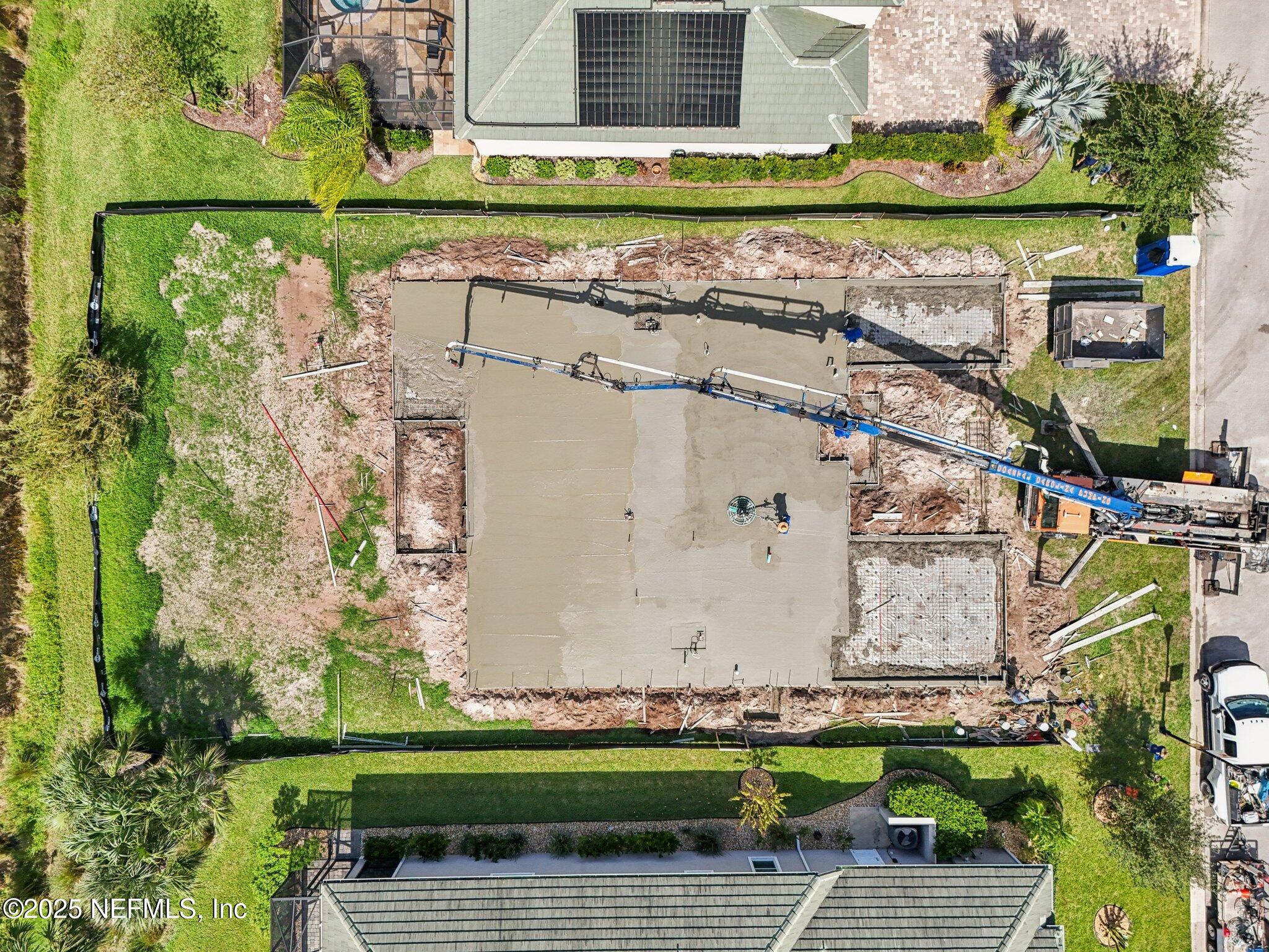 116 Longview Way North Palm Coast, FL 32137 - Photo 17 of 32 a view of a brick wall with a small yard