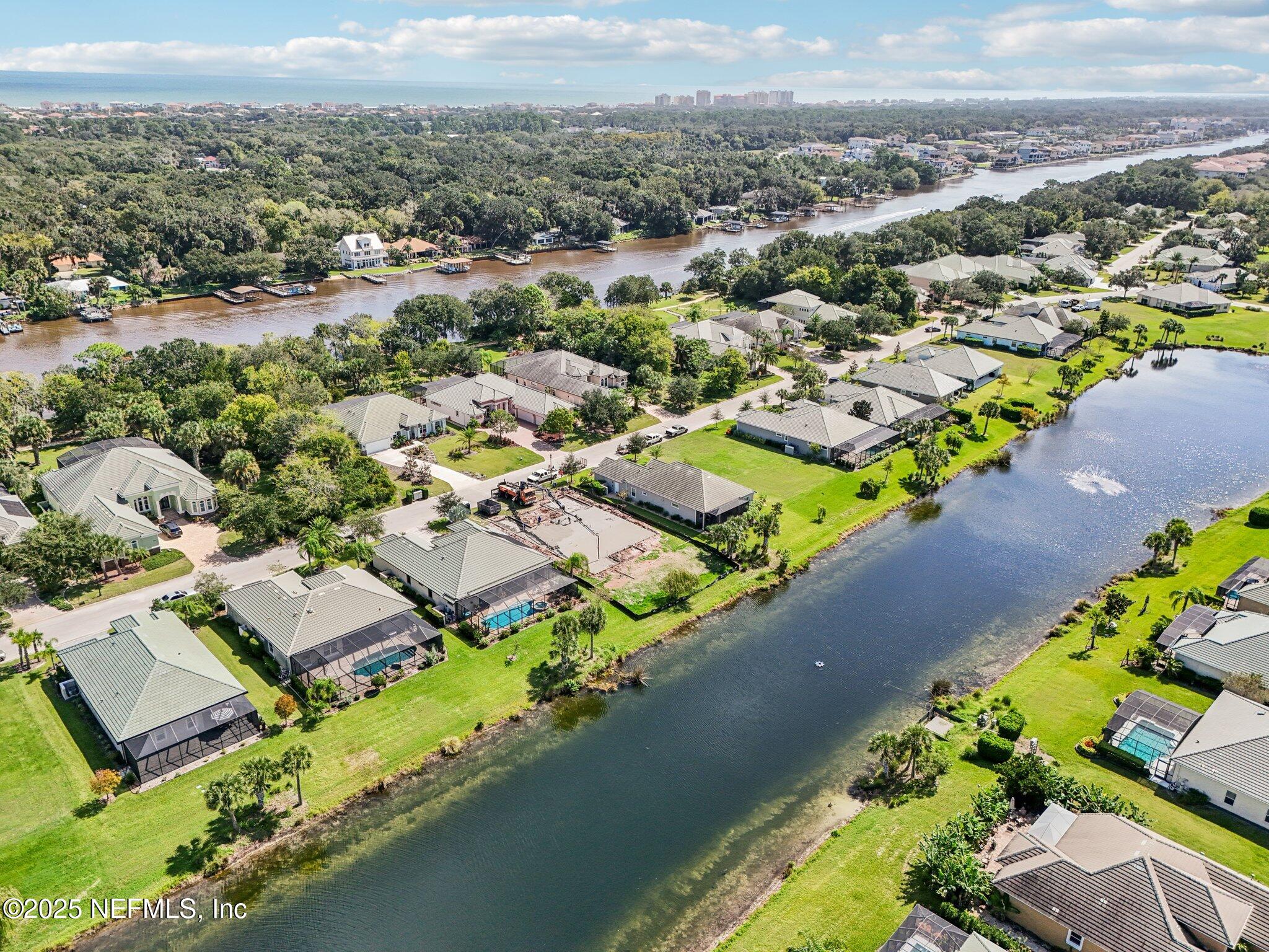 116 Longview Way North Palm Coast, FL 32137 - Photo 18 of 32 an aerial view of residential houses with outdoor space