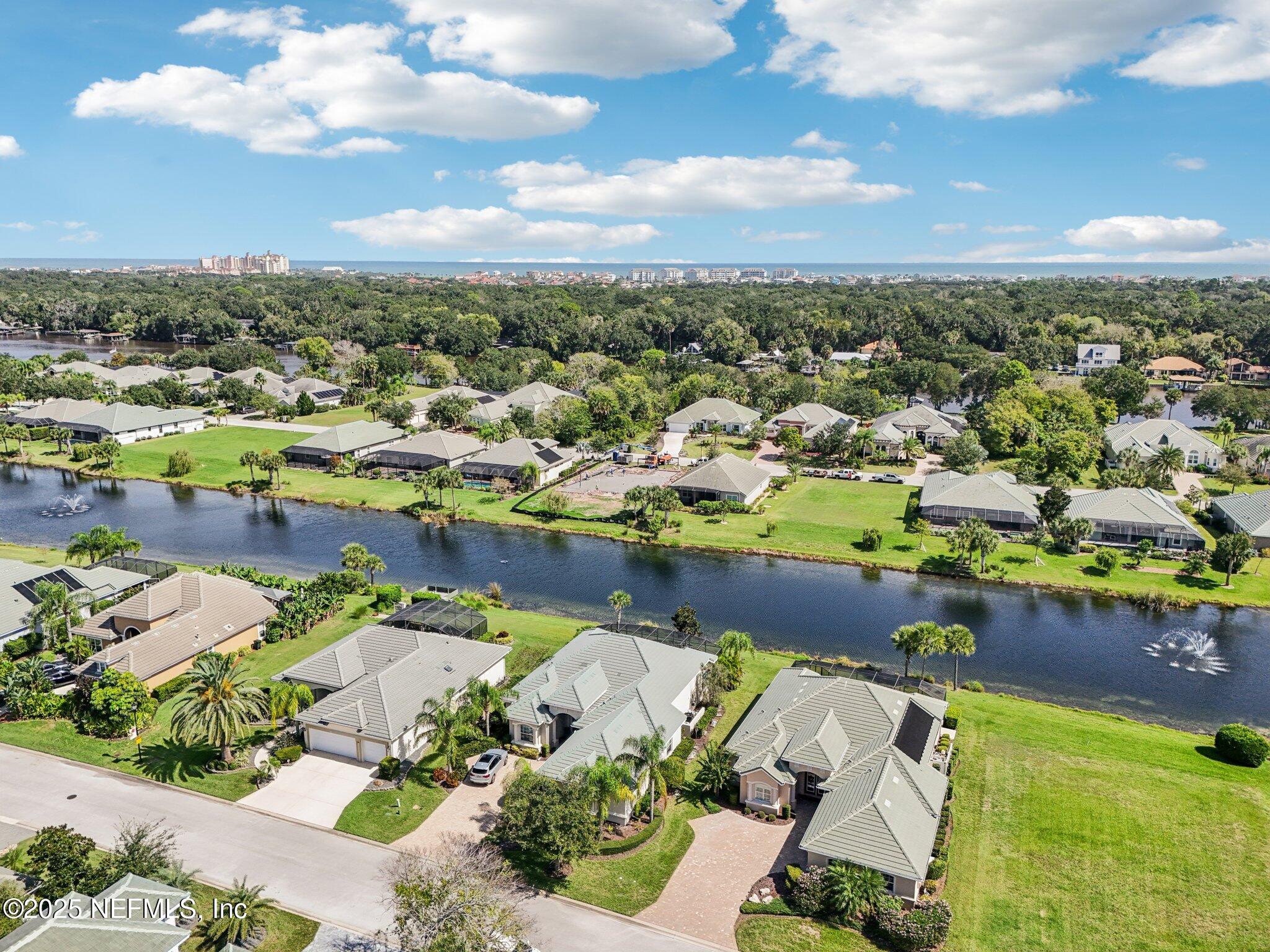 116 Longview Way North Palm Coast, FL 32137 - Photo 19 of 32 an aerial view of residential houses with outdoor space