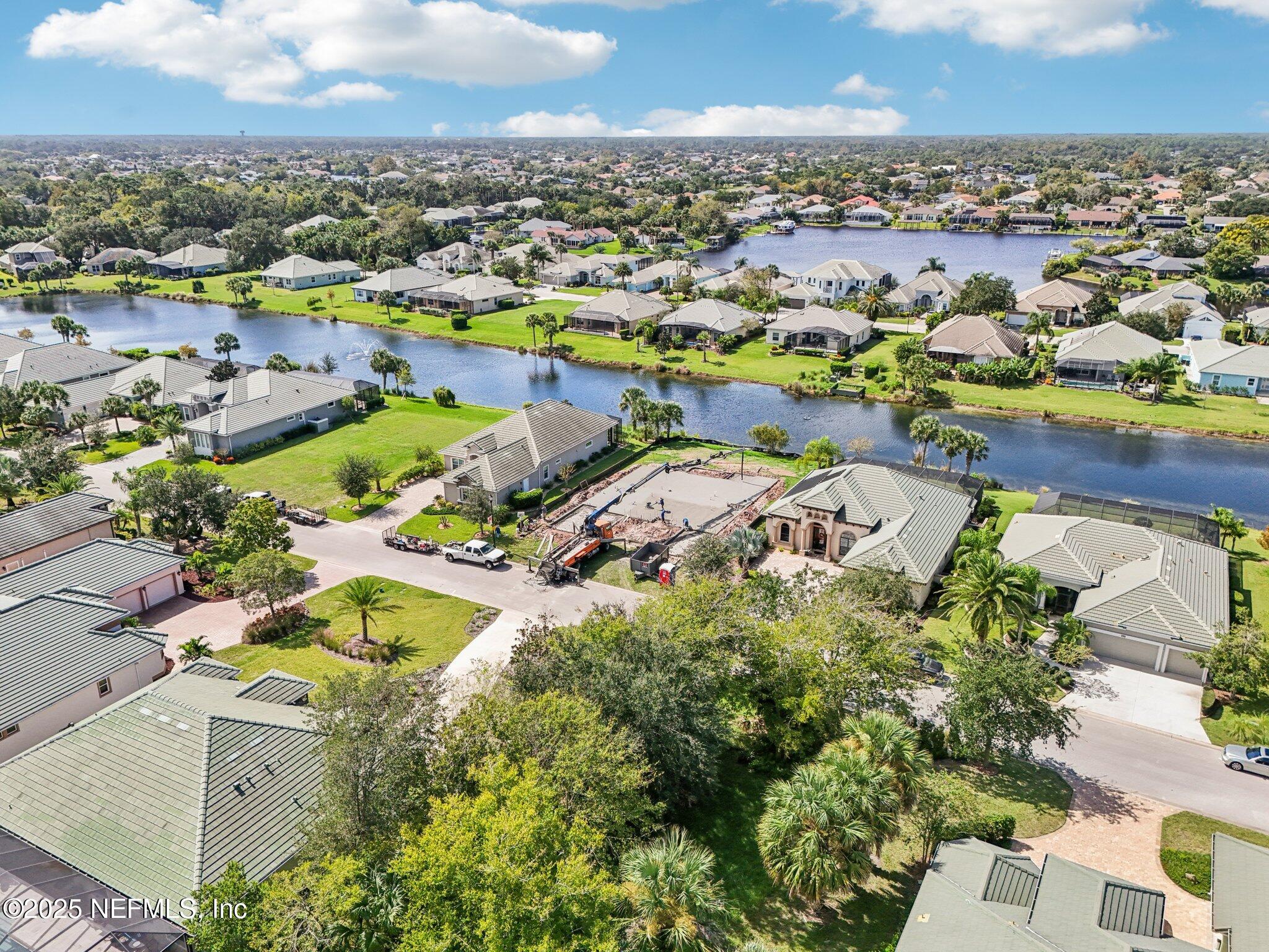 116 Longview Way North Palm Coast, FL 32137 - Photo 24 of 32 an aerial view of residential houses with outdoor space