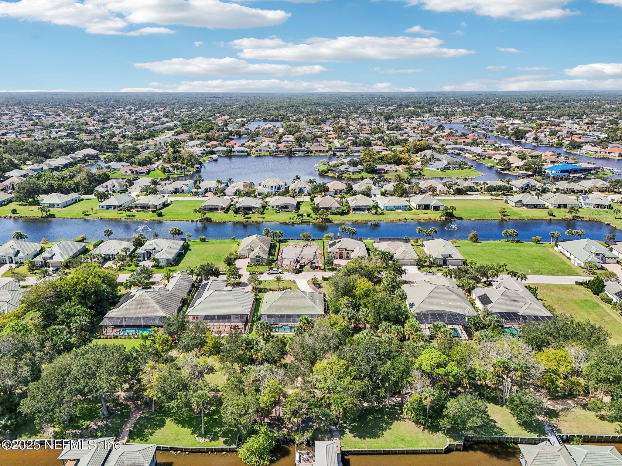116 Longview Way North Palm Coast, FL 32137 - Photo 25 of 32 an aerial view of residential houses with outdoor space