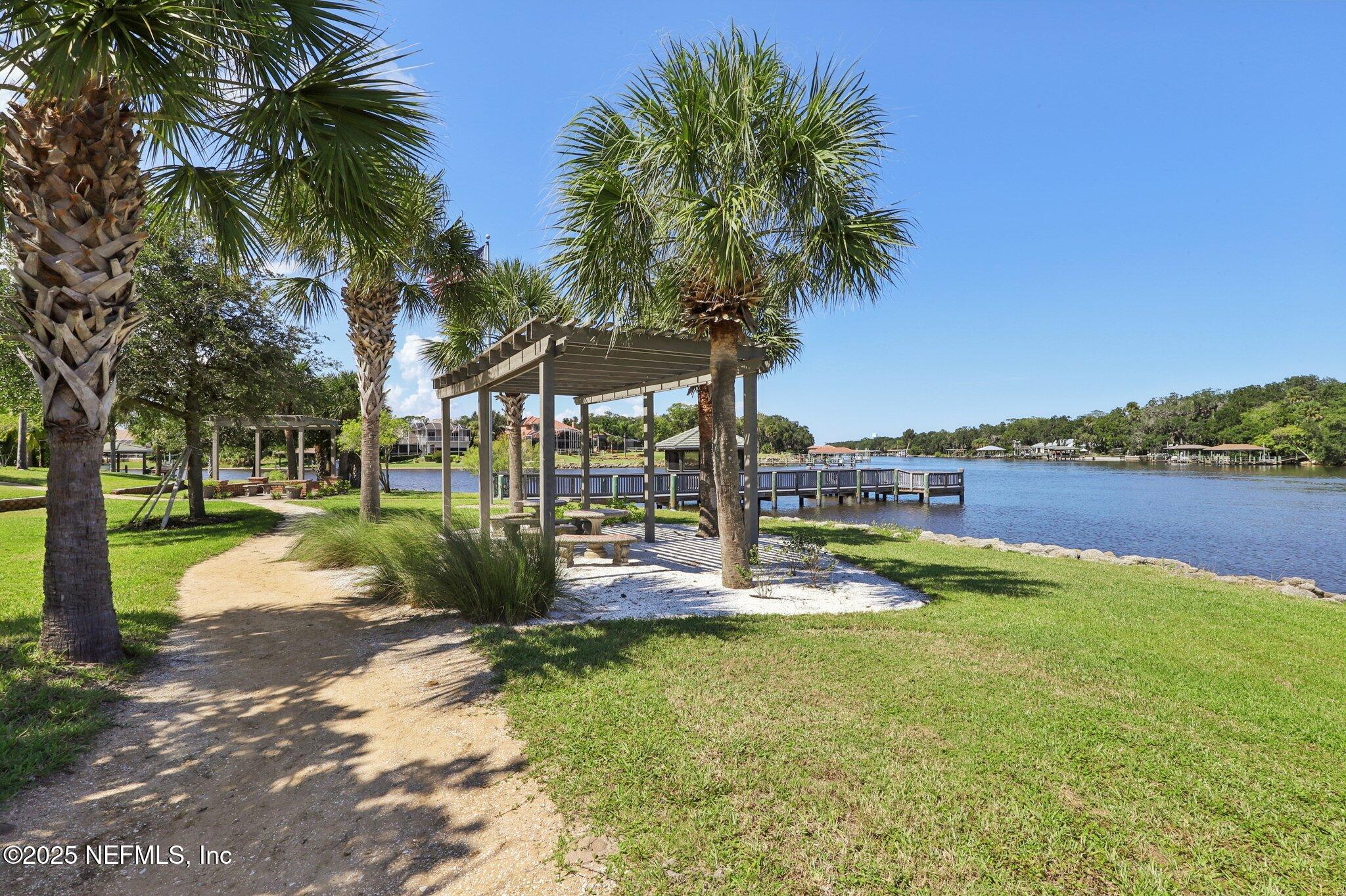 116 Longview Way North Palm Coast, FL 32137 - Photo 27 of 32 a view of a lake with houses
