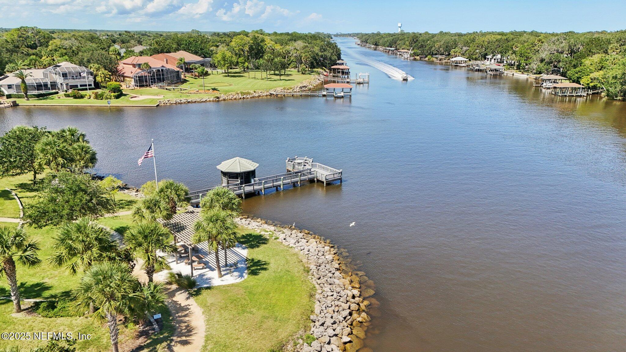 116 Longview Way North Palm Coast, FL 32137 - Photo 29 of 32 an aerial view of a house with a lake view