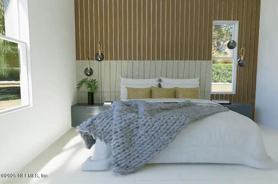 116 Longview Way North Palm Coast, FL 32137 - Photo 8 of 32 a bedroom with a bed and a window