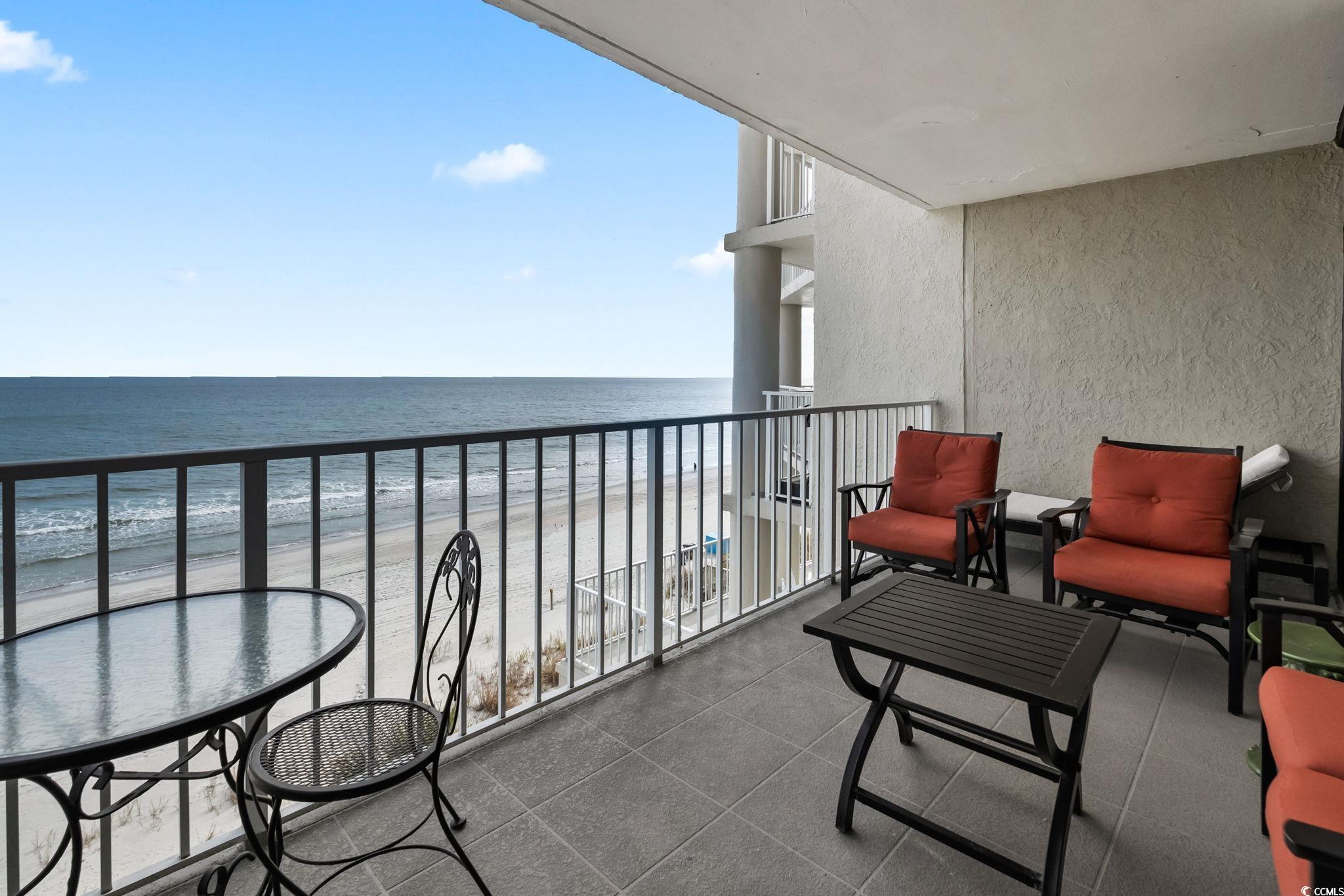 1990 North Waccamaw Drive, Unit 403 Murrells Inlet, SC 29576 - Photo 3 of 39 Balcony with view of water and beach