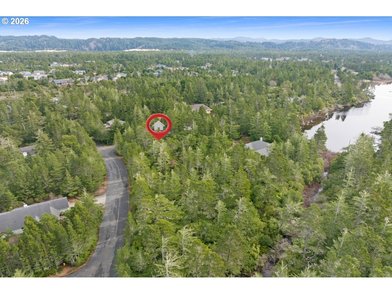 Woodlake Way Florence, OR 97439 - Photo 3 of 23 a view of city and mountains