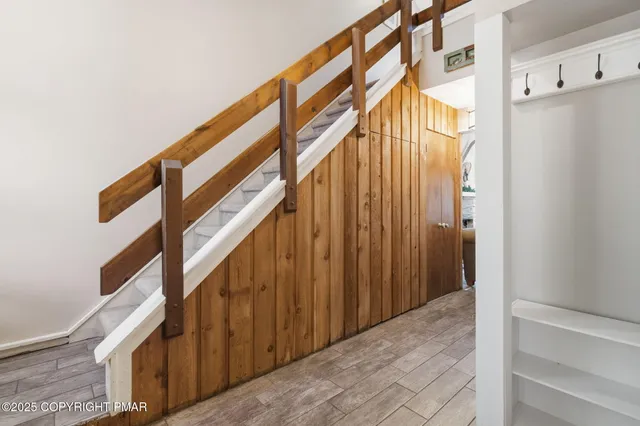 a bedroom with a bed and a walk in closet