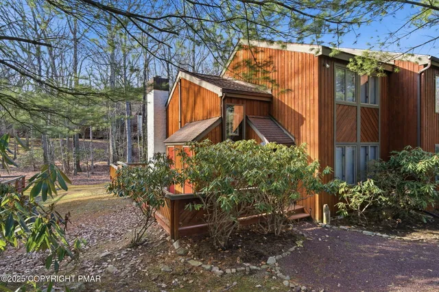 a kitchen with stainless steel appliances granite countertop a sink stove and microwave
