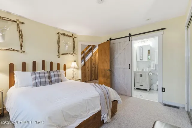 a living room with furniture and a couch