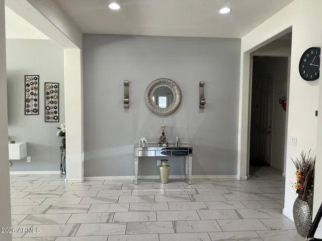 a view of a livingroom with furniture and furniture