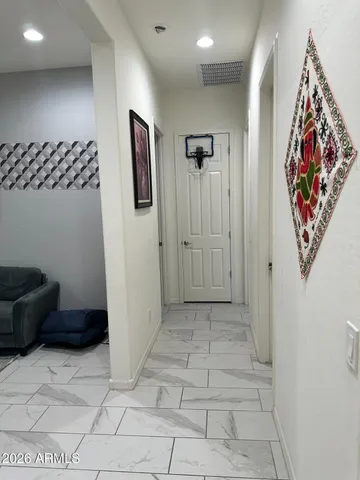 a bathroom with a sink toilet and mirror